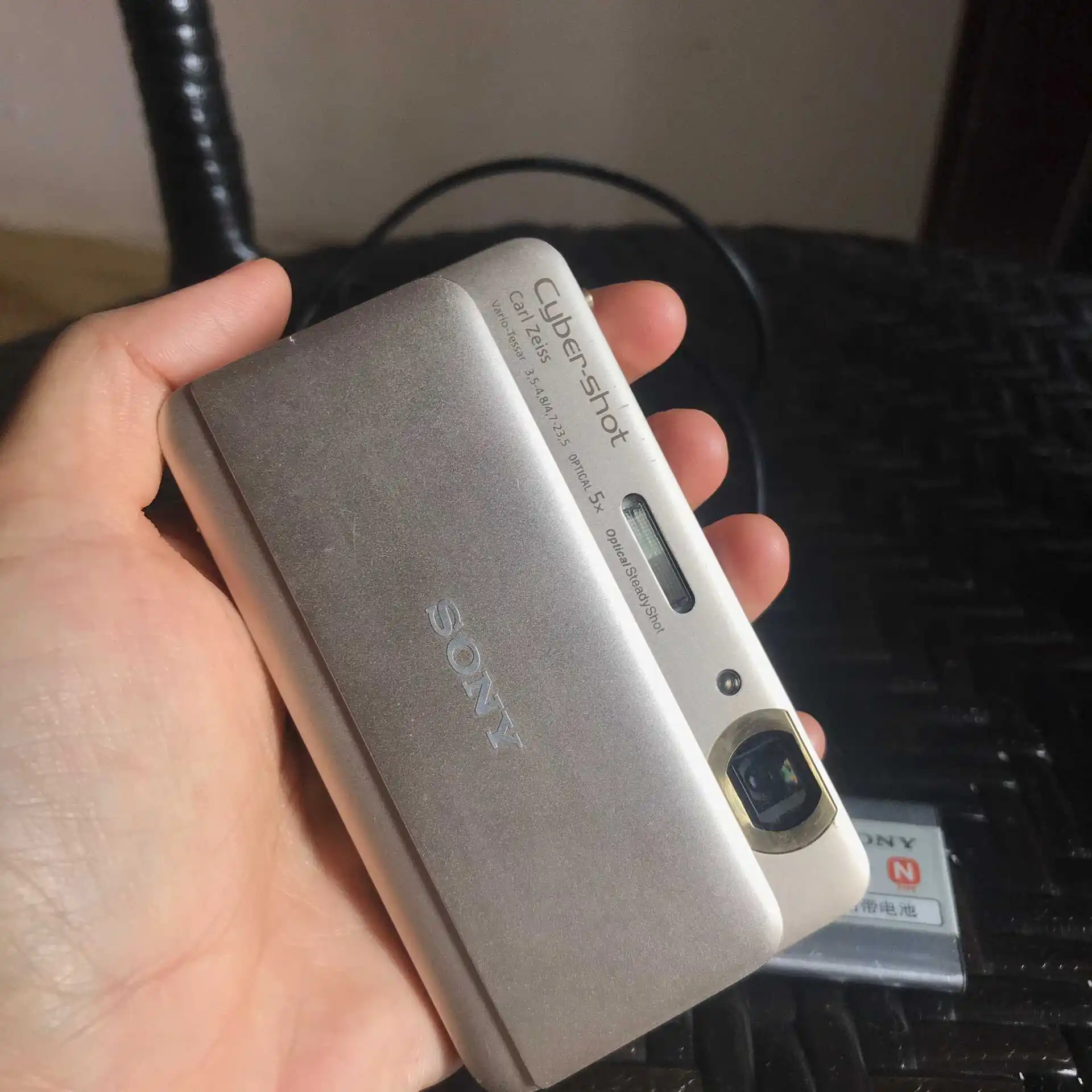  USED Sony Cyber-shot DSC-TX55 16.2 MP Slim Digital Camera with 5x Optical Zoom and 3.3-Inch OLED to