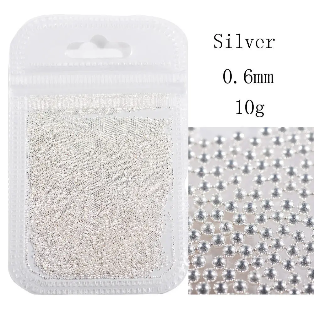 0.6mm silver 0,6-2.0mm10g мини-икра металлическая микросфера из нержавеющей стали горный хрусталь 3D Шарм DIY украшения для ногтей - Цвет: 0.6mm silver