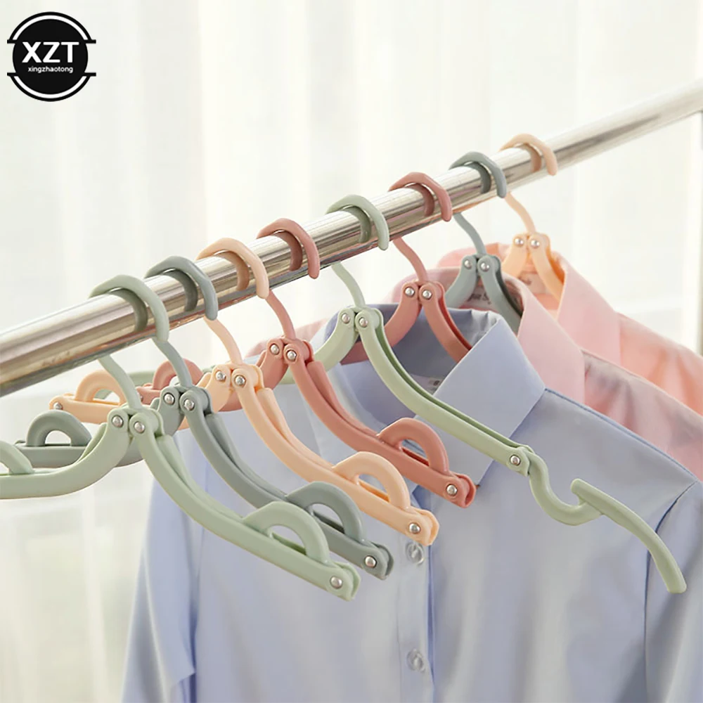 вешалка-плечики складная. складная вешалка для одежды. плечики складные металлические германия v214. складные вешалки плечики для одежды. складные вешалки.