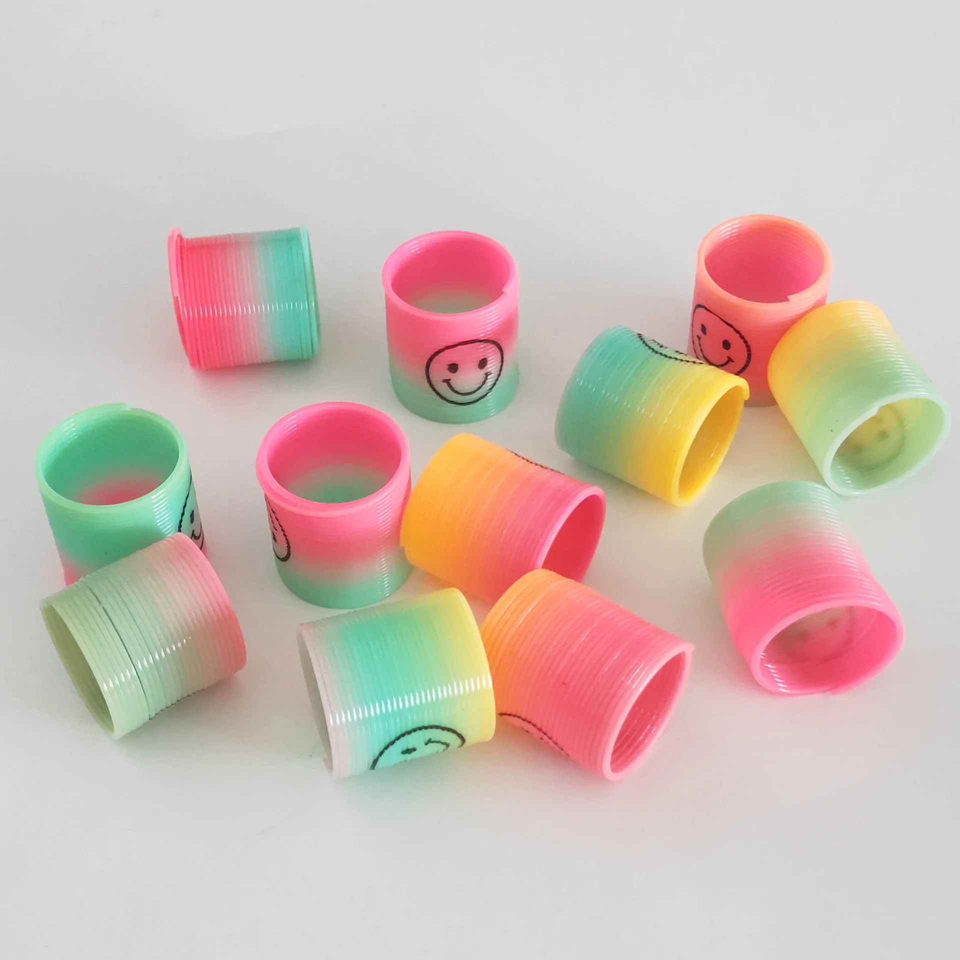 Ground Promotion Small Gift Smiley Spring Rainbow Ring Rainbow Tower Creative Children'S Educational Toy Gift 12 a Bag