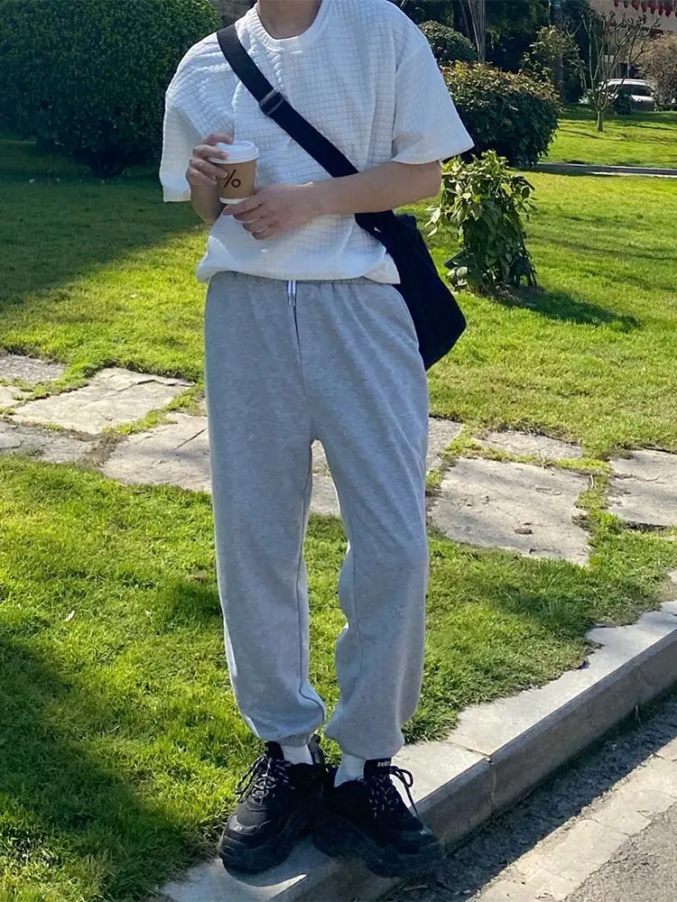 

2021 new casual nine-point sports pants simple men's drawstring drawstring all-match trousers loose trend