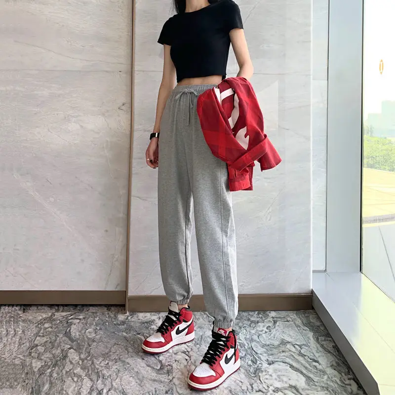

Gray sports pants female students Korean autumn and winter plus velvet loose binding feet slimming Joker ins Harlan casual pants