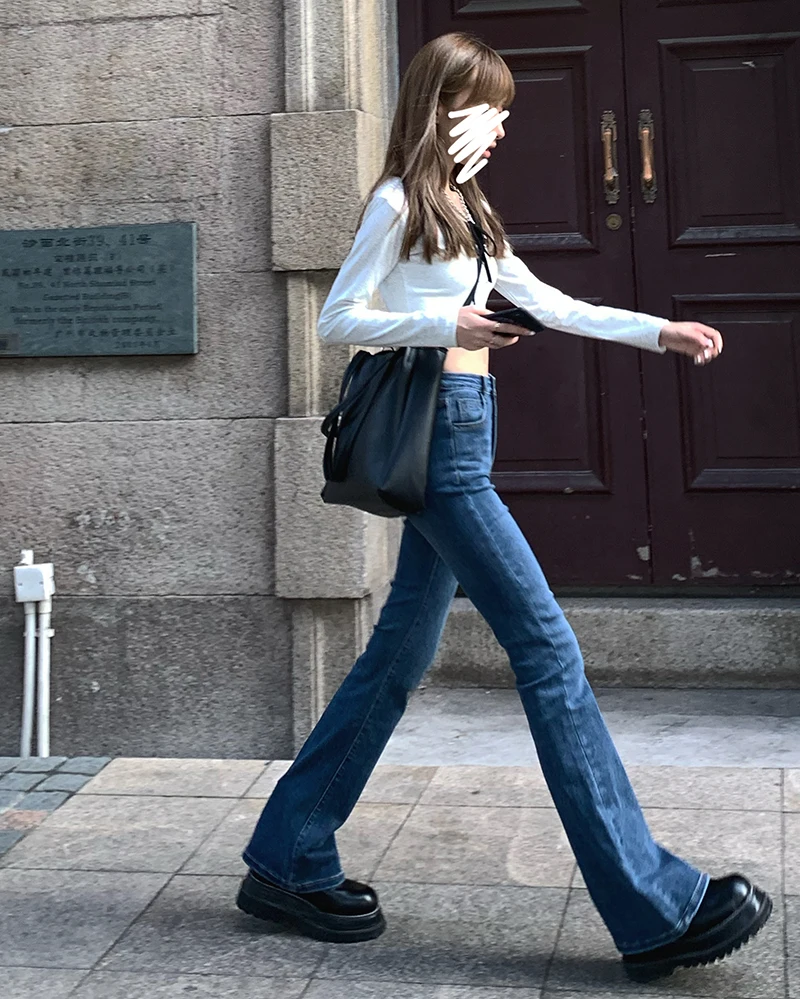 vintage feminina, calça monocromática, cintura alta, corpo