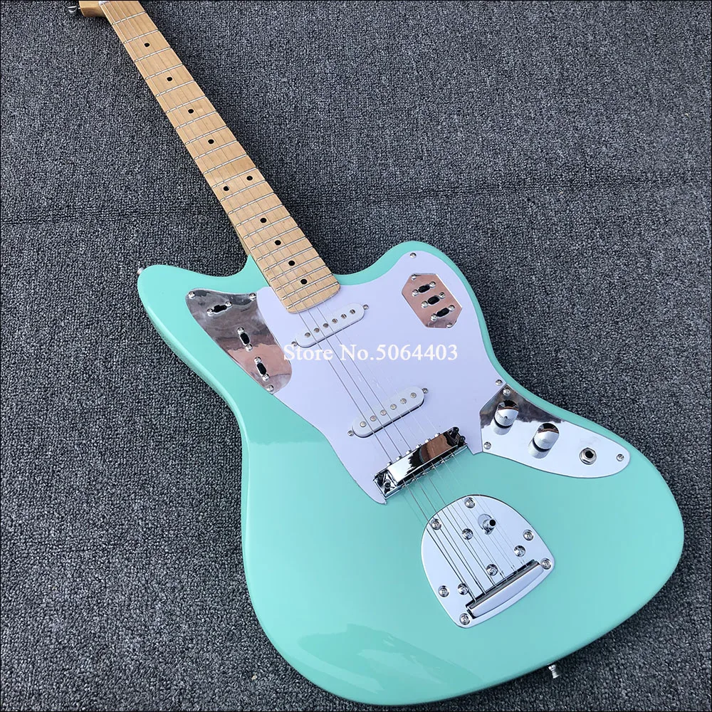 

Factory direct sales of light green electric guitar, vibrato bridge, maple neck, big head, real photos, postage