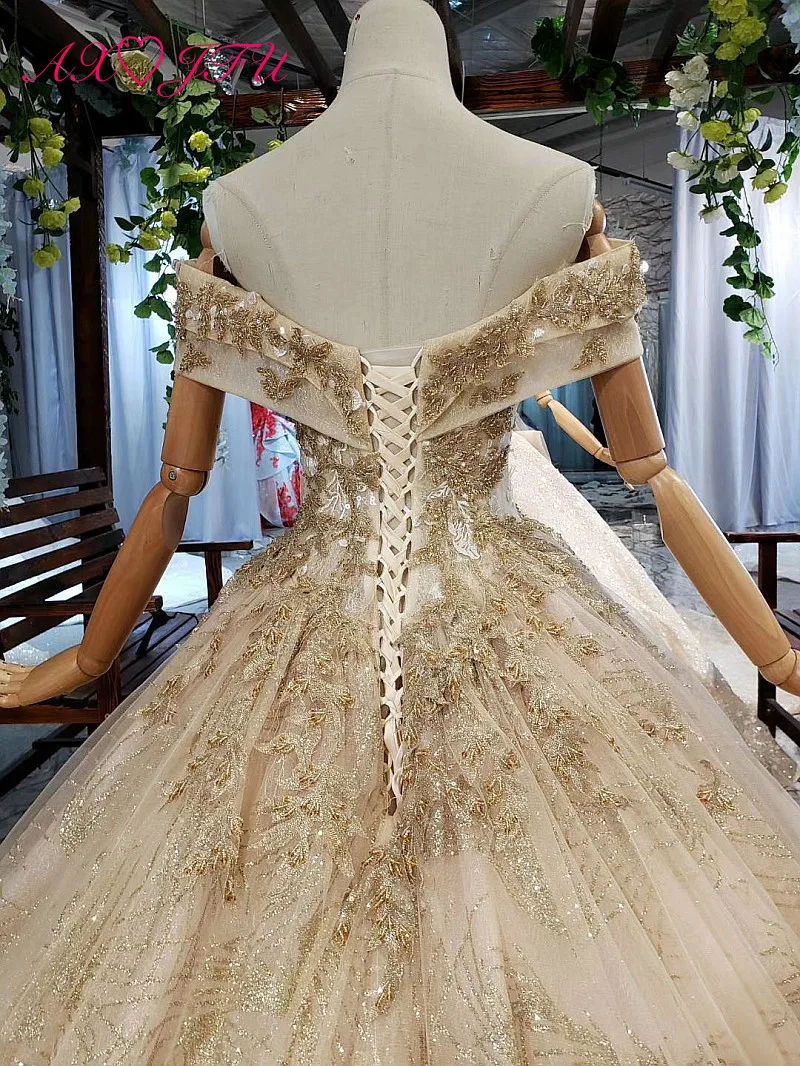AXJFU Luxury princess golden flower lace boat neck beading crystal sparkly star bride tail wedding dress real photo 11669