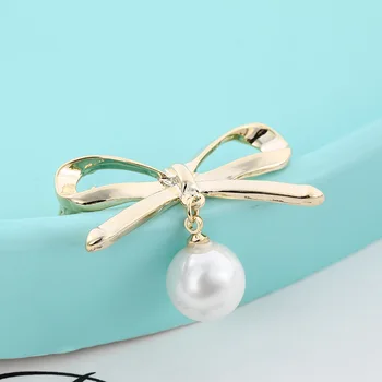 

Sweet joker texture bowknot pearl brooches female contracted temperament sweater cardigan pin shawl brooch