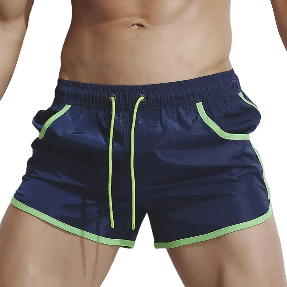 New Men's Waterproof Running Fitness Three-point Pocket Shorts Sexy Fashion Beach Pants - Color: Blue