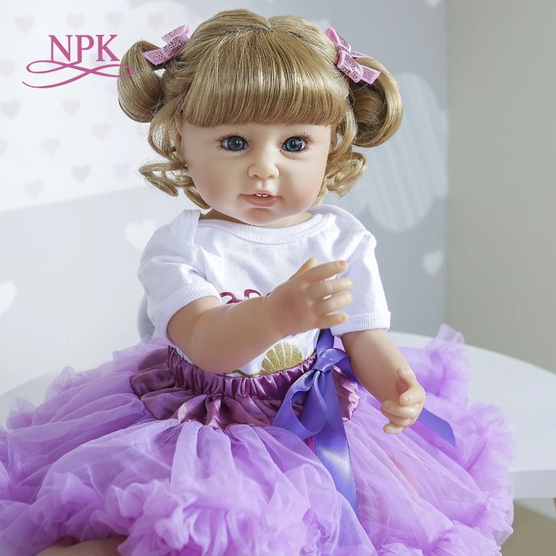 Кукла-новорожденная силиконовая в фиолетовом платье 55 см | Игрушки и хобби