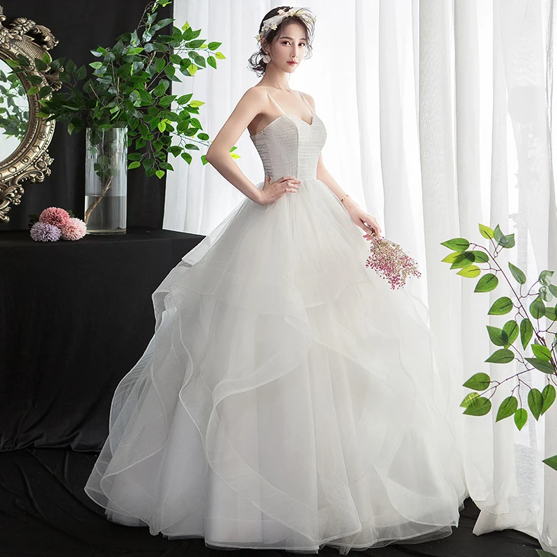 vestido-de-noiva-sem-mangas-decote-em-v-luxuoso-com-rendas-para-baile-de-casamento-princesa