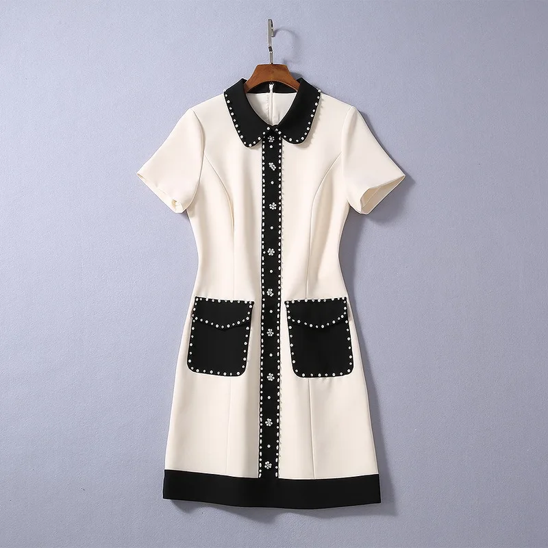 

New European and American women's dresses for spring 2020 Short sleeve lapel Contrast color Heavy hammer bead Fashion dress