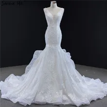 Белые свадебные платья ручной работы с цветами с v-образным вырезом без рукавов, кружевные свадебные платья Serene hilm HM66964 на заказ