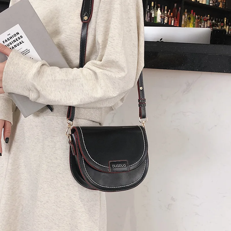 

The saddle bag girl 2019 new tide Korean edition 100 lap oblique saddle bag simple fashion texture girl single shoulder bag