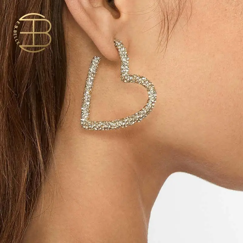 Женские серьги кольца золотого цвета с кубическим цирконием вечерние в форме