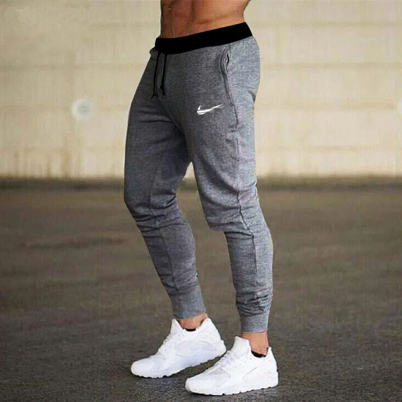 2021 nuevos hombres pantalones de Fitness pantalones primavera elástica culturismo entrenamiento pantalones pista pantalones hombres camisetas pantalones de chándal