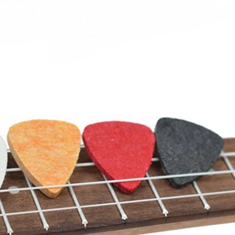 Hot Ukulele Accessory Kit with Ukulele Felt Picks Celluloid Picks Leather Picks Holder Multicoloured Strings and White Nylon Str