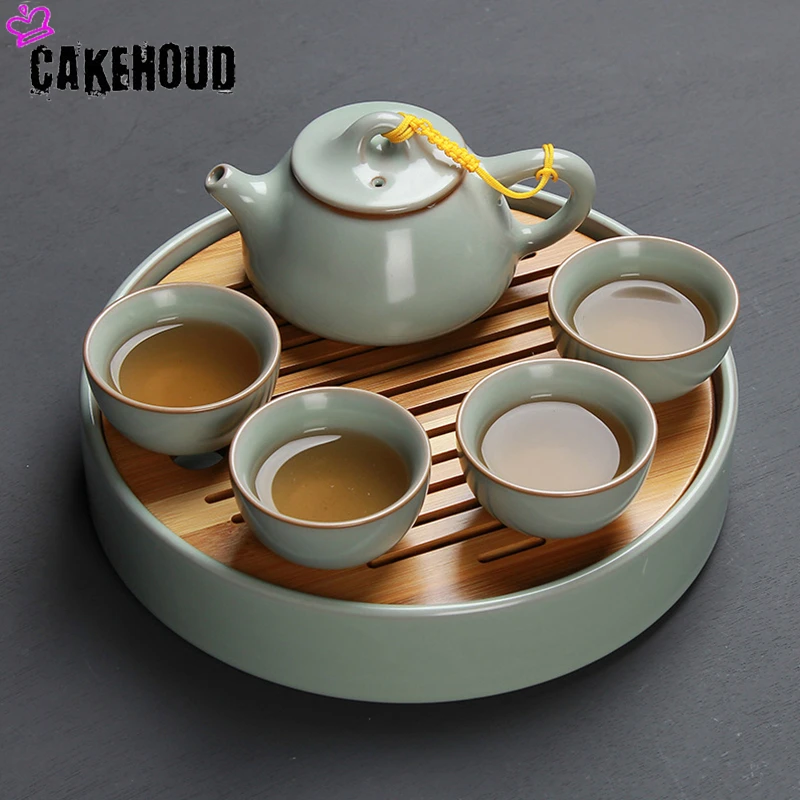 

CAKEHOUD Portable Ceramic One Pot Four Cups Travel Tea Set Chinese Kung Fu Tea Set Tea Cup Tea Tray Tea Ceremony Accessories