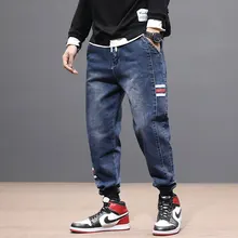 Fashion Streetwear Men Jeans Loose Fit Slack Bottom Cargo Pants Stripe Printed Designer Denim Harem Trousers Hip Hop Jeans Men