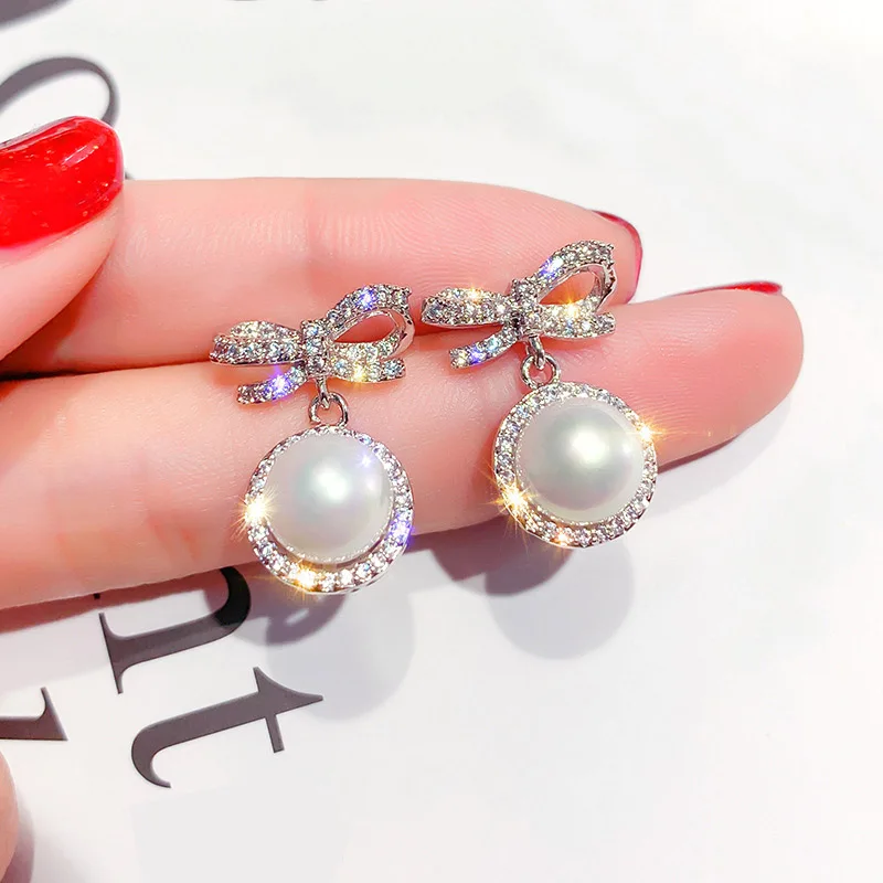 

Temperament Women New Fashion Pearl Earrings Personality Metal Geometry Water Drop Kinds Of Exaggerated Drop earrings Jewelry