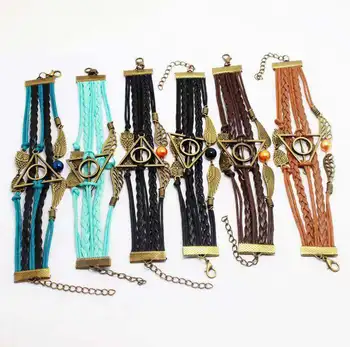 

Harri Potter Death Hallows Retro Leather Cord Bracelet Golden Wings Flying Thief Triangle Action Figure Multilayer Bracelet