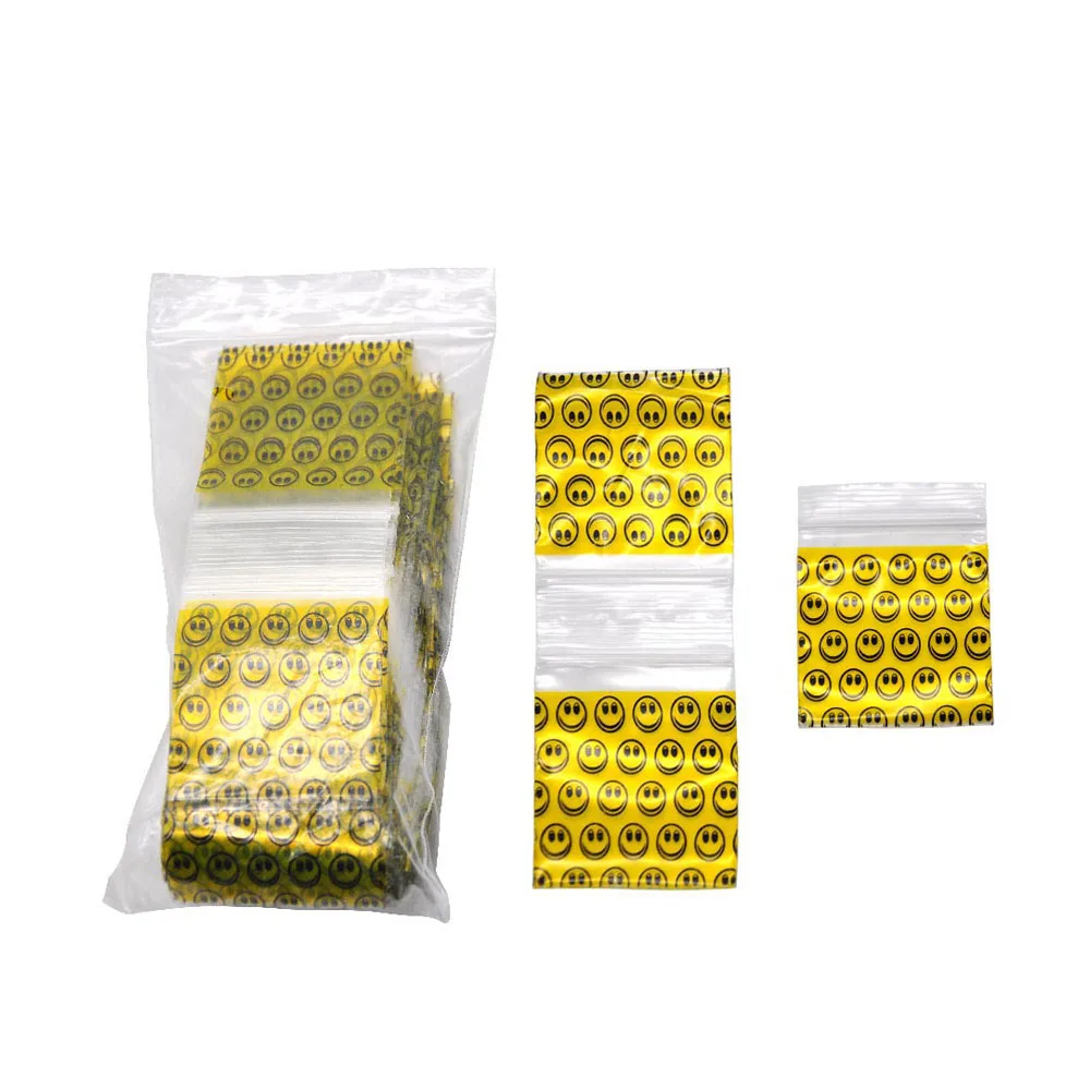 

Yellow smiley plastic sealed bag 100 sticks 46*44mm large tobacco pack re-sealable cellophane pouch packaging storage sealed bag