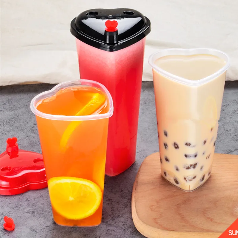 https://ae01.alicdn.com/kf/Ha72e11f58d154171919323b62c8ab317Q/50pcs-Net-red-heart-shape-love-milk-tea-cup-500ml-transparent-disposable-coffee-cup-birthday-party.jpg