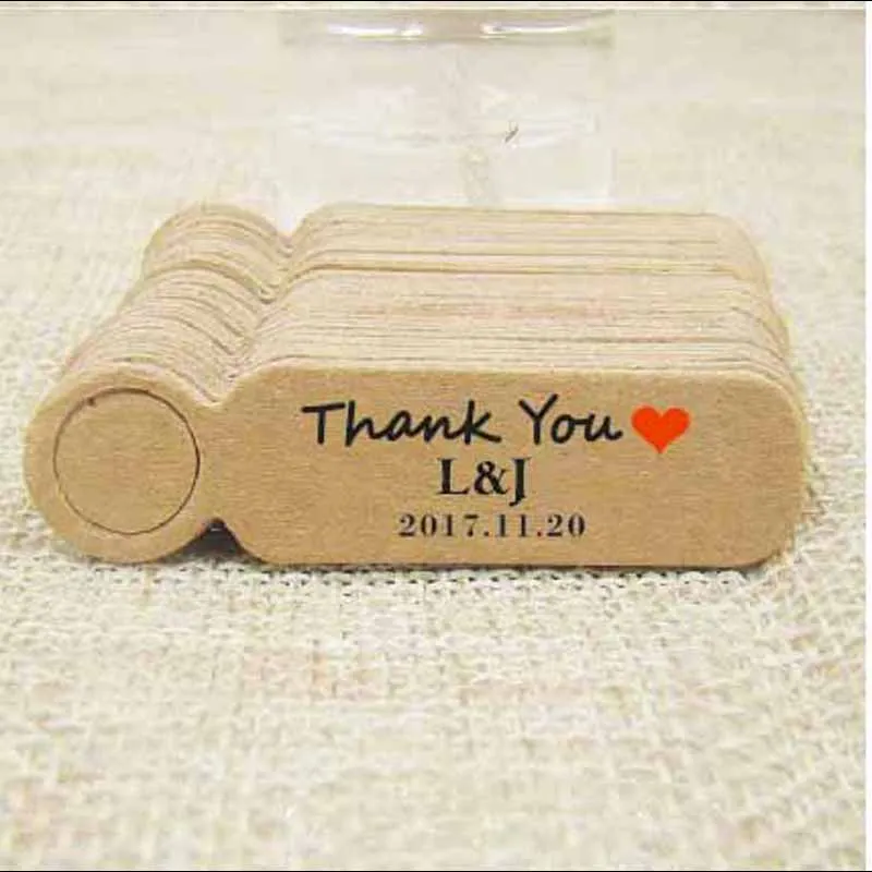

Custom logo wedding name tag kraft /white paper gift hang tag candy favors /charms brand swing tag with logo print 100pcs as moq