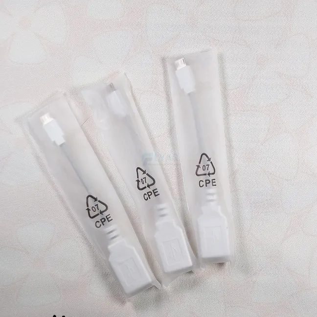 Câble adaptateur USB OTG original DJI pour Phantom 4 Pro, emballage et câble déroulé.