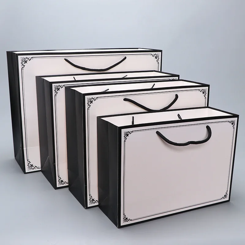 5pcs 2021 Wholesale Coated white cardboard Paper Bag Shopping Gift Bag Custom Logo Paper Clothing Handbag Gift Storage Bag