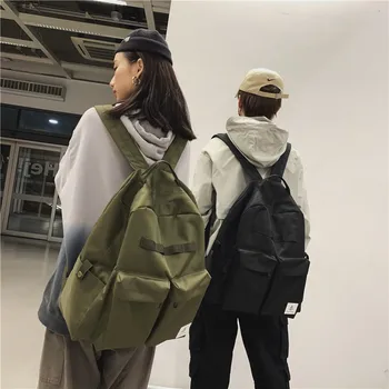 

Backpack men's lightweight tide brand solid color high school student schoolbag black leisure travel backpack