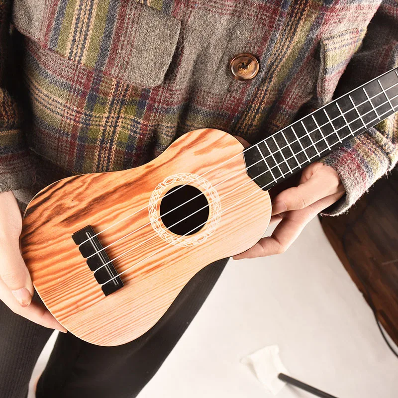17-дюймовый дети музыка гитара модель средней миниатюрная гитара укулеле музыкальный инструмент для малышей Пластик игрушка