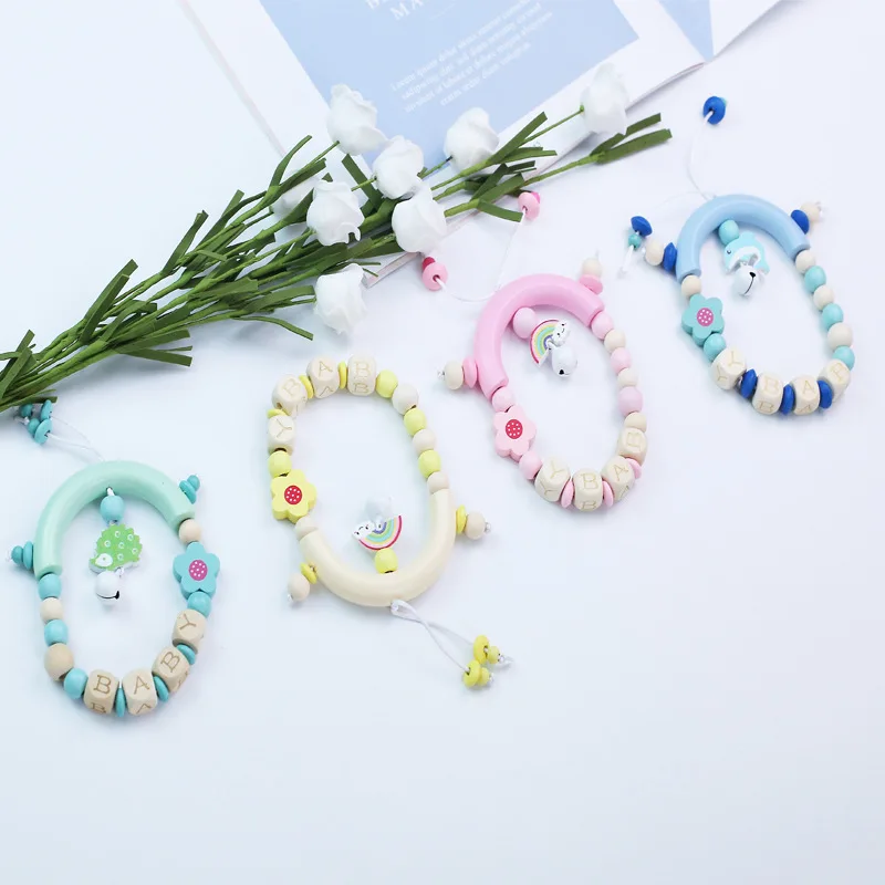 

Mom And Baby New Products Wooden Teeth Handbell Toy Ring Bell Wooden Bell Cartoon Toys Wooden Wooden Bead Hand Bell