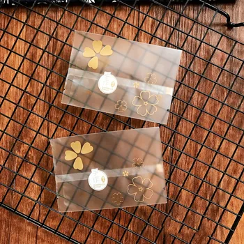 

100pcs/lot Orange Four leaf Clover Frosted Line Flowers Transparent Handmade Snowflake Crispy Nougat Wrapping Party Goodie Bags