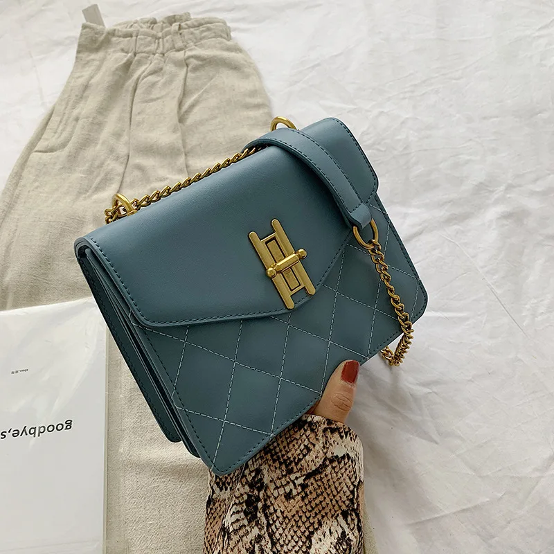 

2019 new sewing thread three-dimensional small square bag irregular lock buckle single shoulder oblique carry woman bag