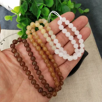 

Hetian Yu 6 mm ball end brown sugar 108 gradient beads