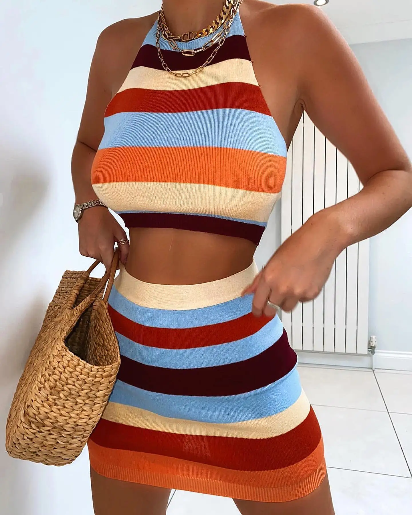 Conjunto de dos piezas de punto para mujer, ropa de fiesta para discoteca sin mangas, Top corto estilo camisola + Mini falda ceñida, traje de Dama