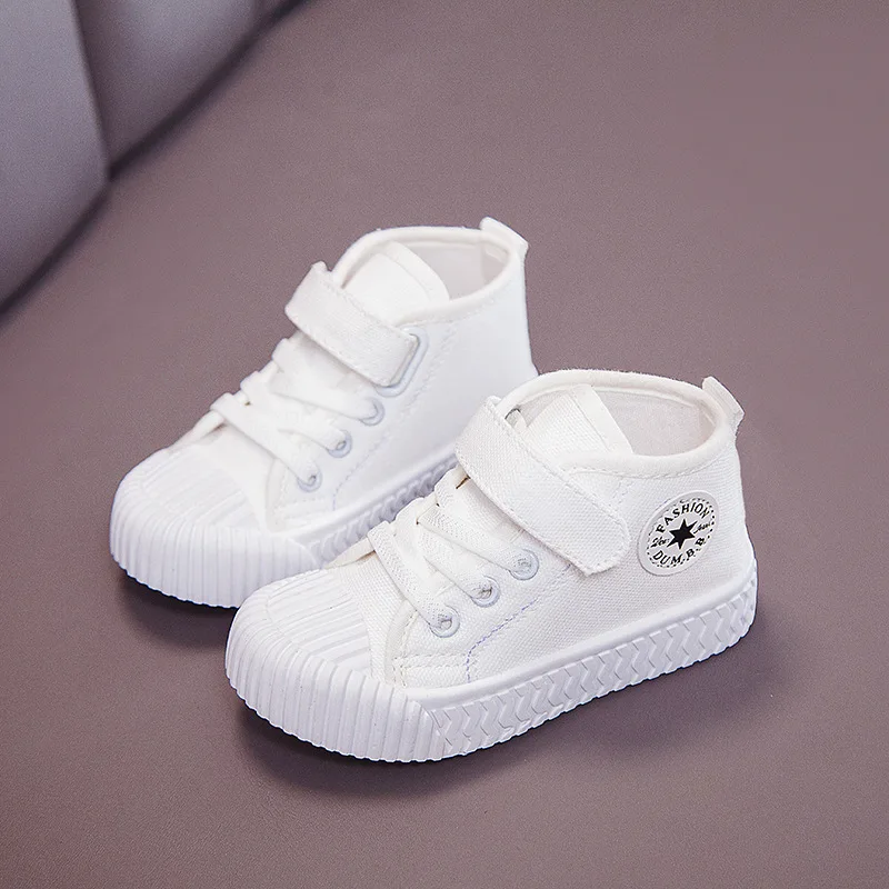 little girl white canvas tennis shoes
