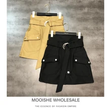 Осенняя новая юбка-трапеция с двумя пуговицами и карманами на молнии