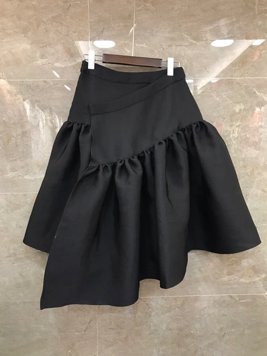 

2019 early autumn new female elastic waist lotus leaf splicing A word swing wild short skirt 831