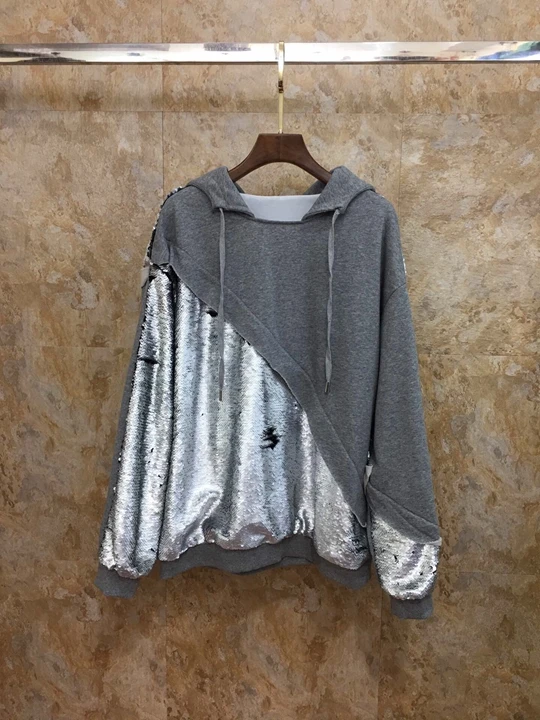 

2019 early autumn new female neckline drawstring hooded sequins stitching long sleeves wild sweater 904