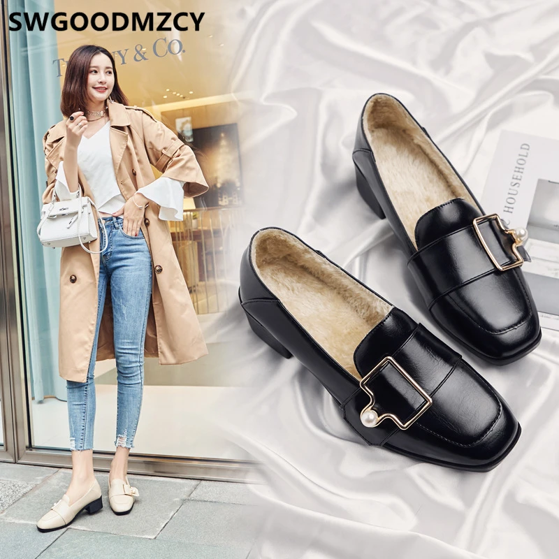 black female shoe designer