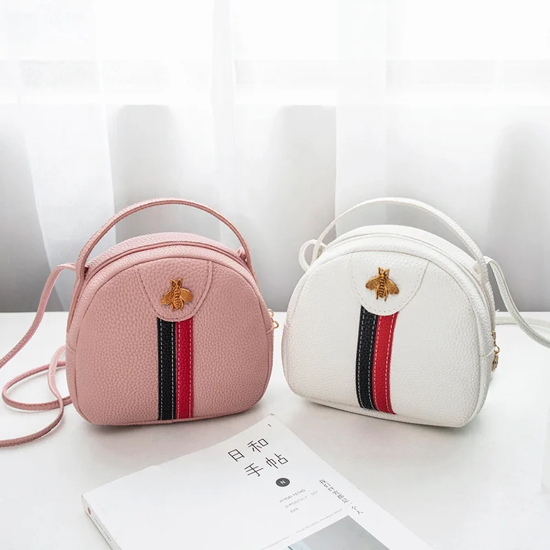 

Hand female small bag autumn and winter small round bag mobile phone bag New style Korean-style cool minimalist shoulder ba