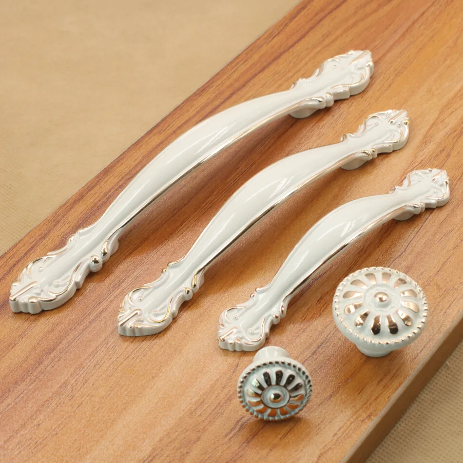 

Ivory handle handle door cabinet drawer zinc alloy European modern simple single hole round boutique thickening