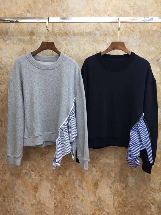 

2019 Early autumn new women's round collar side irregular stitching streak zipper long sleeve 100-jacket 913
