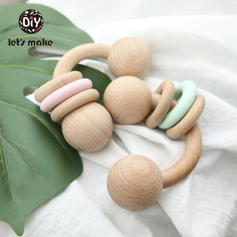 

Let's Make Wooden Baby Toys Rattles For Babies Musical Semicircle Beech Wood Ring Bell Hand Hold PVC Free 1PC Children's Toys