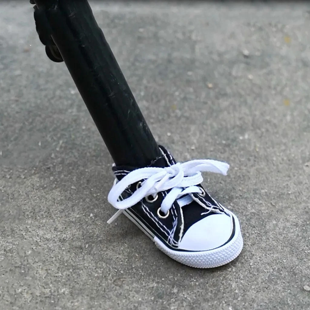 Soporte de pie para motocicleta zapatos pequeños, trípode para bicicleta, decoración escolar, accesorios para muñeco colgante, zapatillas de deporte de Color caramelo