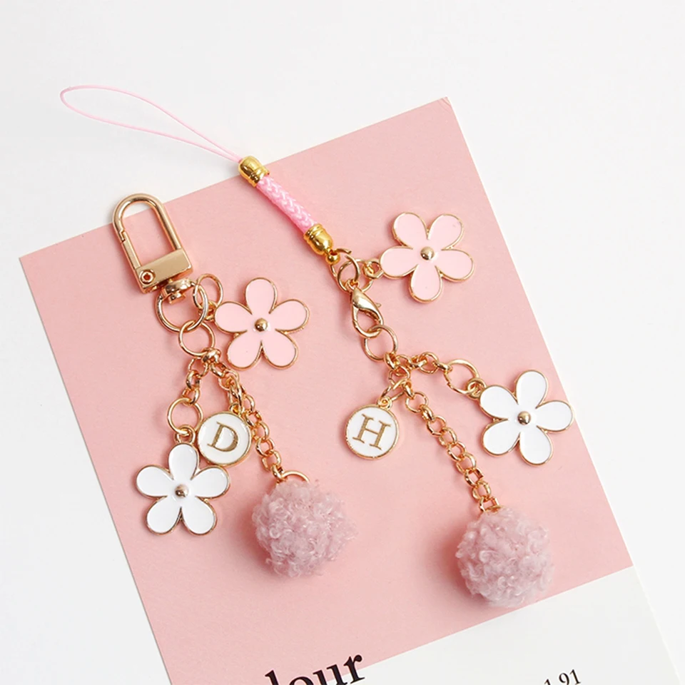 

Ins Luxury Cherry Flower KeyChains Car Keys Bag Key Chains Decor Plush Ball Pendent Charms for Airpods for Samsung Buds Gifts