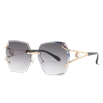 

2021 New frameless fashion women's Sunglasses with diamond cutting Sunglasses Women's trend ocean film fashion glasses