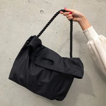 

UP Chen Dingding 2019 shoulder bag men's and women's casual nylon port wind simple large capacity travel messenger bag