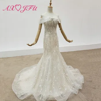 شراءAXJFU الفاخرة الأميرة البوق الخرز اللؤلؤ الوهم اليدوية قارب الرقبة العروس الأبيض الدانتيل حورية البحر فستان الزفاف 100% صور حقيقية