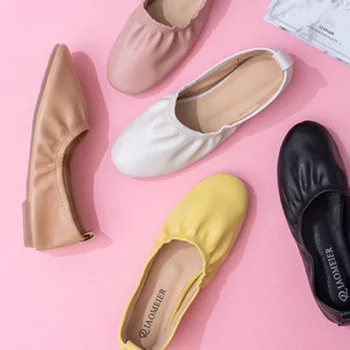

Flat single shoes female 2019 new round head shallow mouth set foot roll peas shoes